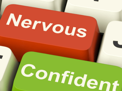 computer button with words nervous and confident