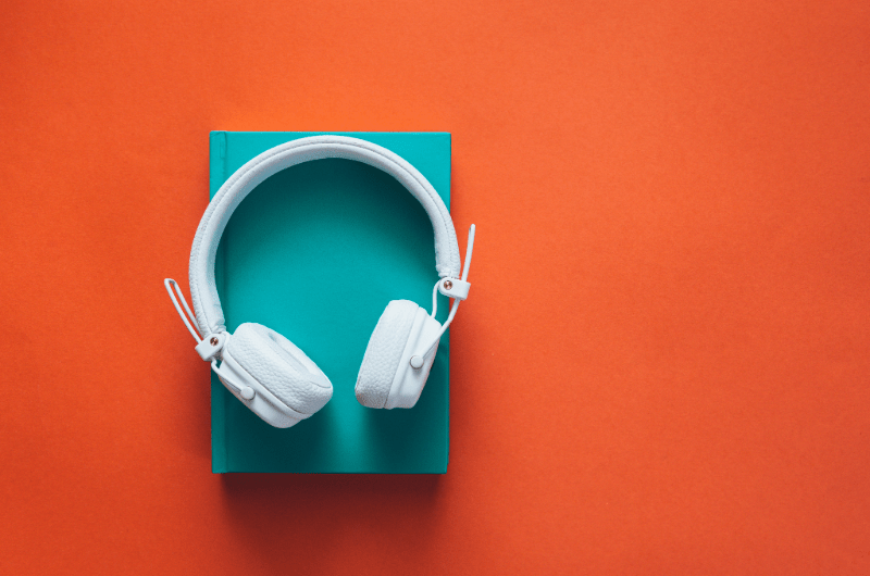 Headphones on top of a notebook